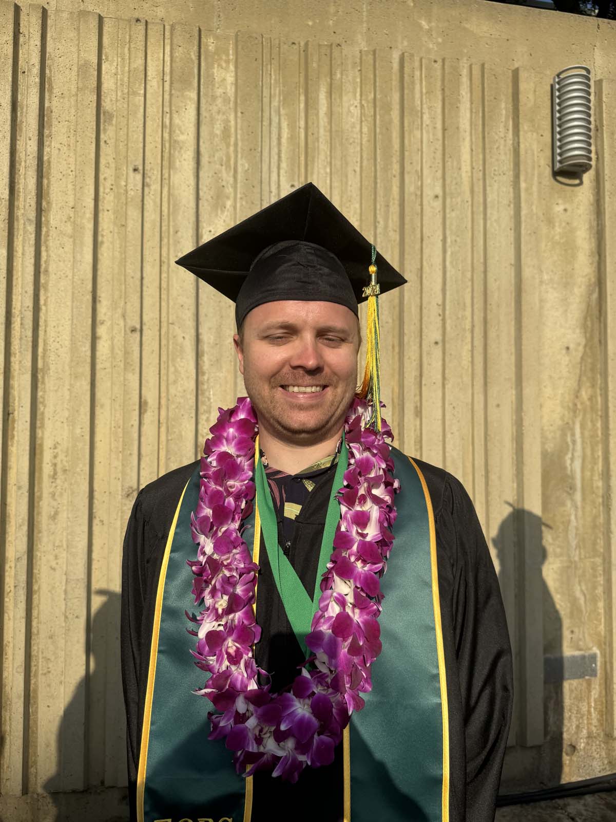 Graduates walk to stage at CHC's Commencement 2024.