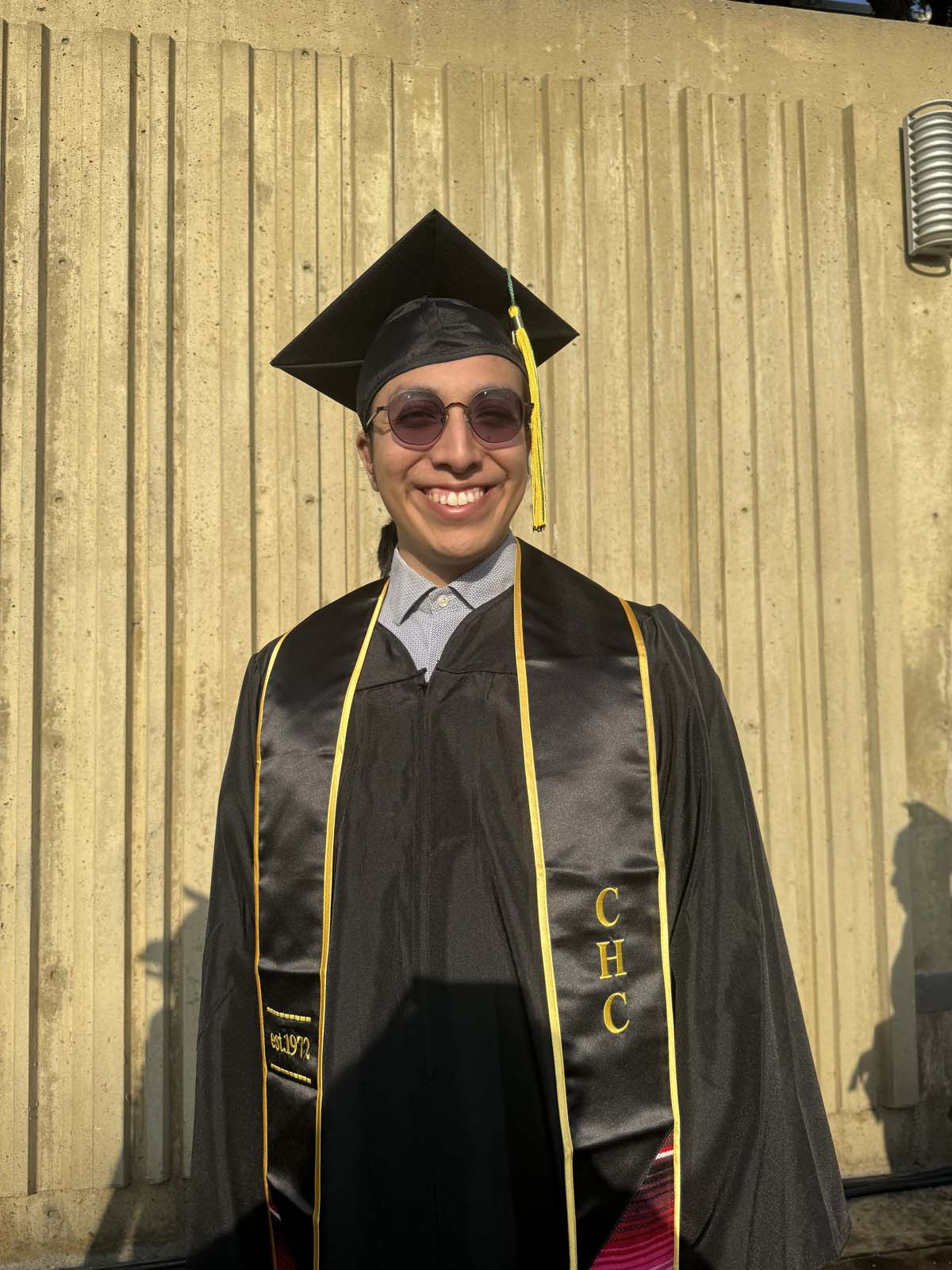 Graduates walk to stage at CHC's Commencement 2024.
