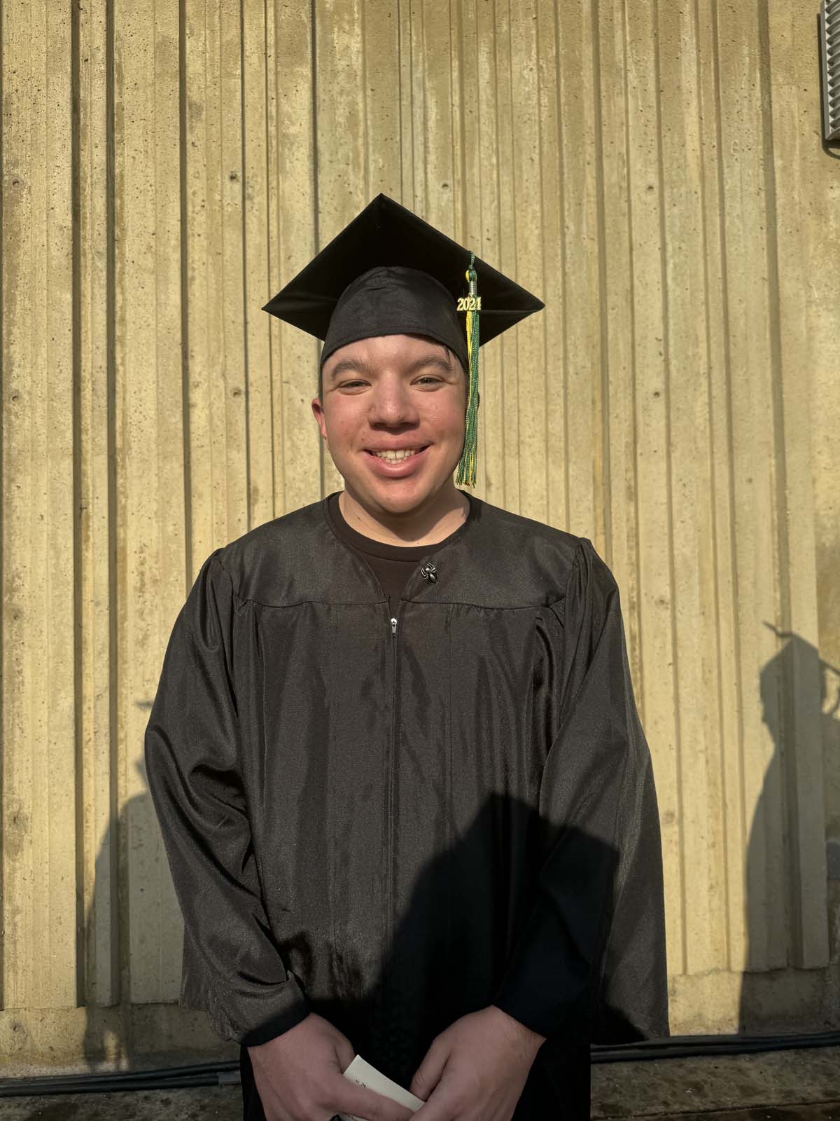Graduates walk to stage at CHC's Commencement 2024.