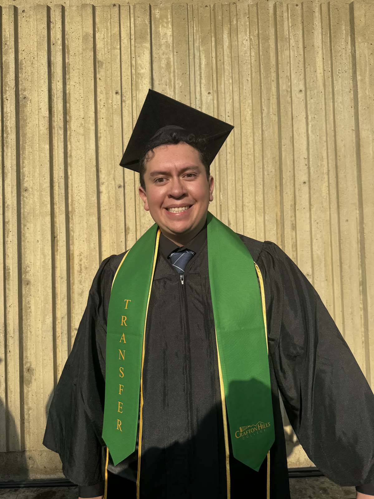 Graduates walk to stage at CHC's Commencement 2024.