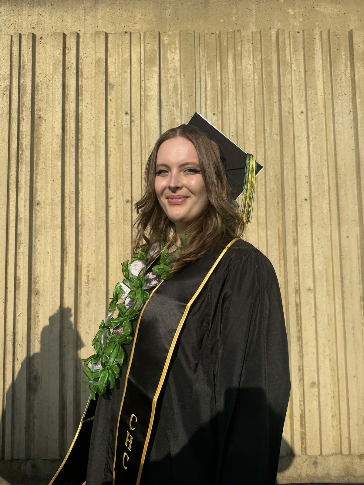 Graduates walk to stage at CHC's Commencement 2024.