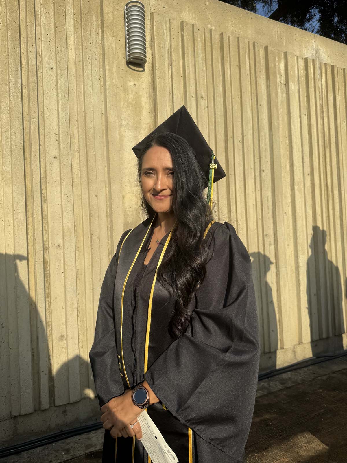 Graduates walk to stage at CHC's Commencement 2024.