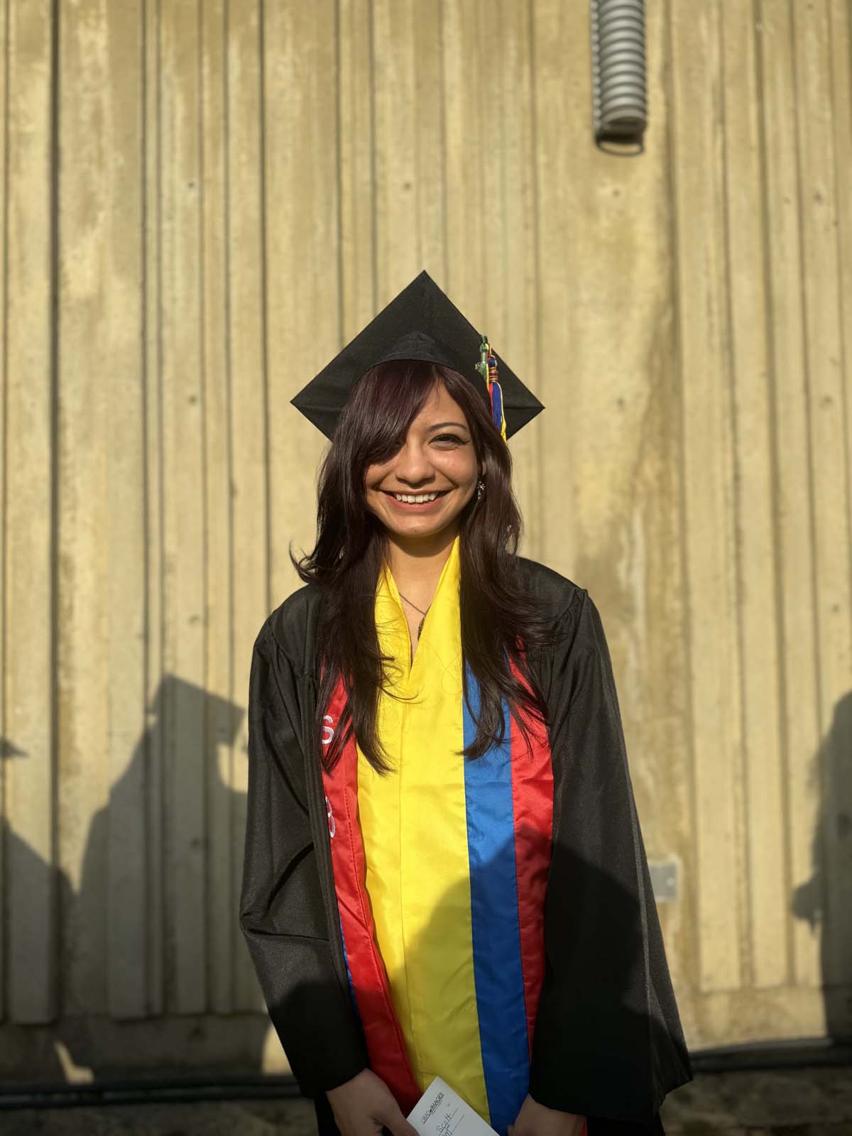 Graduates walk to stage at CHC's Commencement 2024.