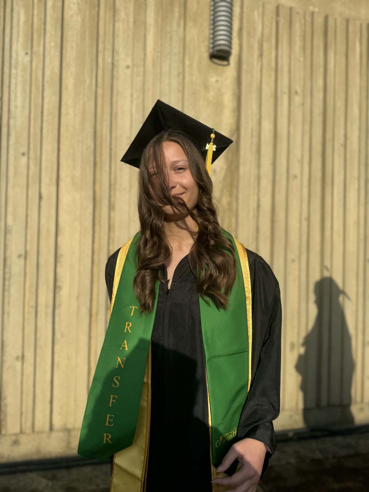 Graduates walk to stage at CHC's Commencement 2024.