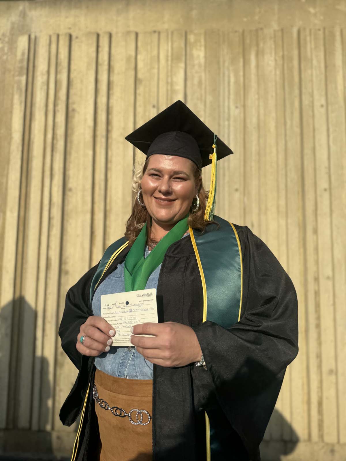 Graduates walk to stage at CHC's Commencement 2024.