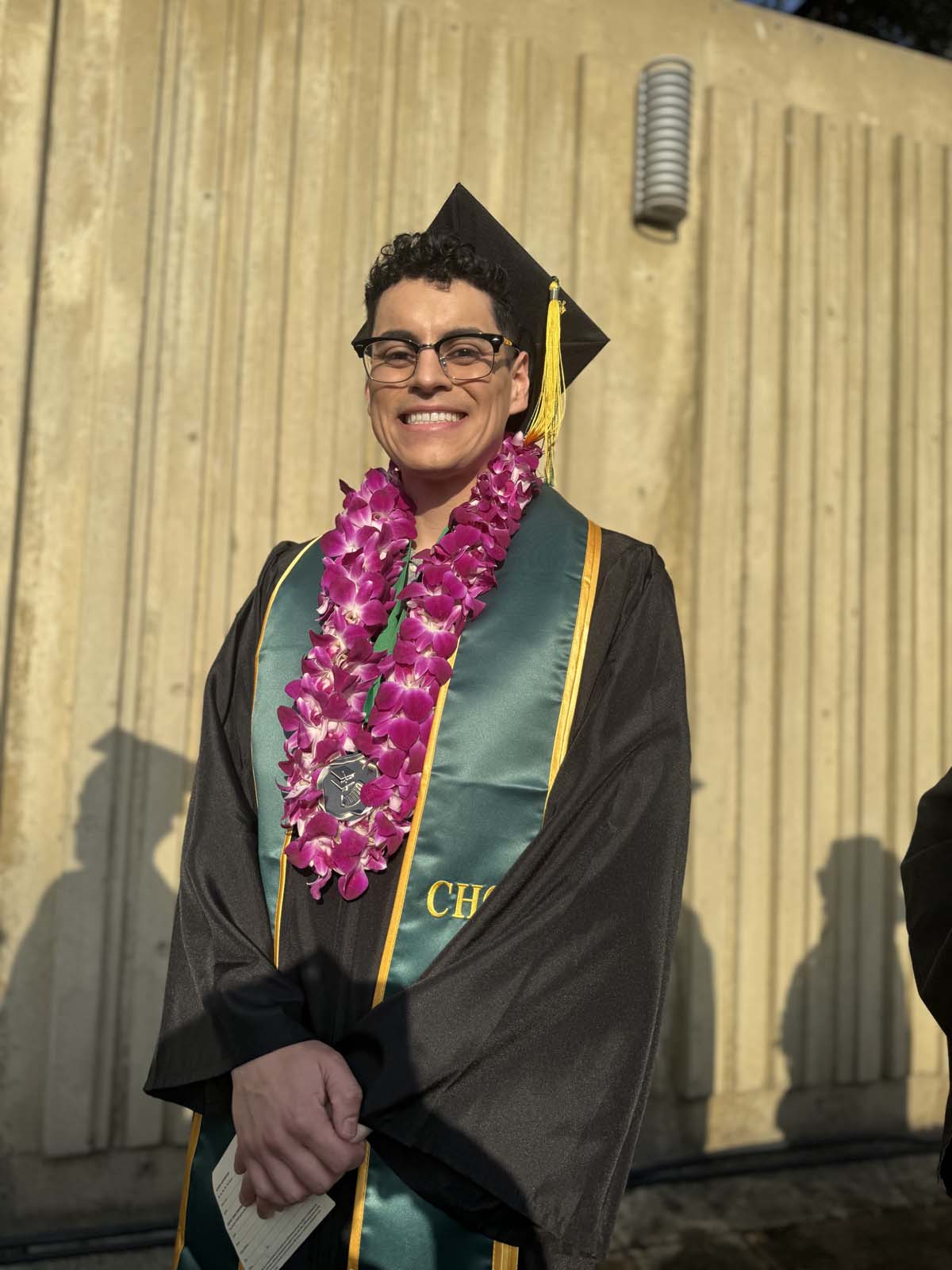 Graduates walk to stage at CHC's Commencement 2024.