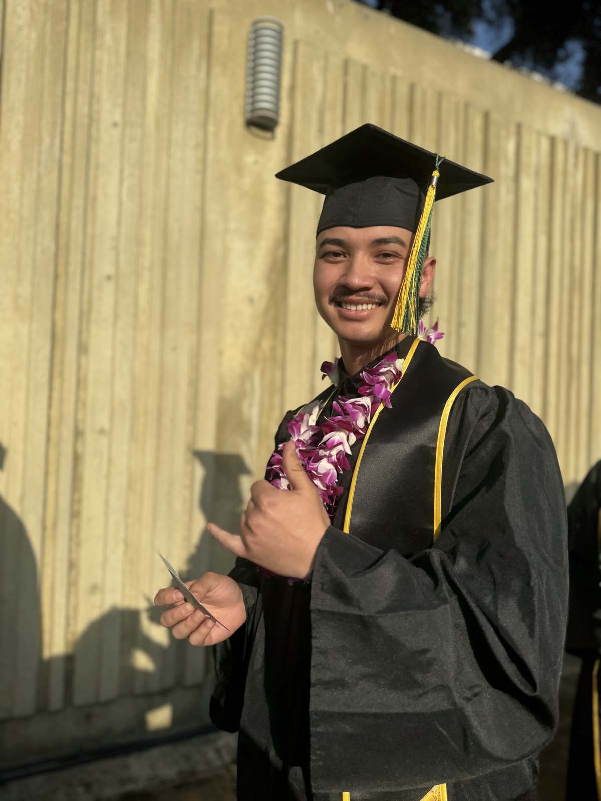 Graduates walk to stage at CHC's Commencement 2024.