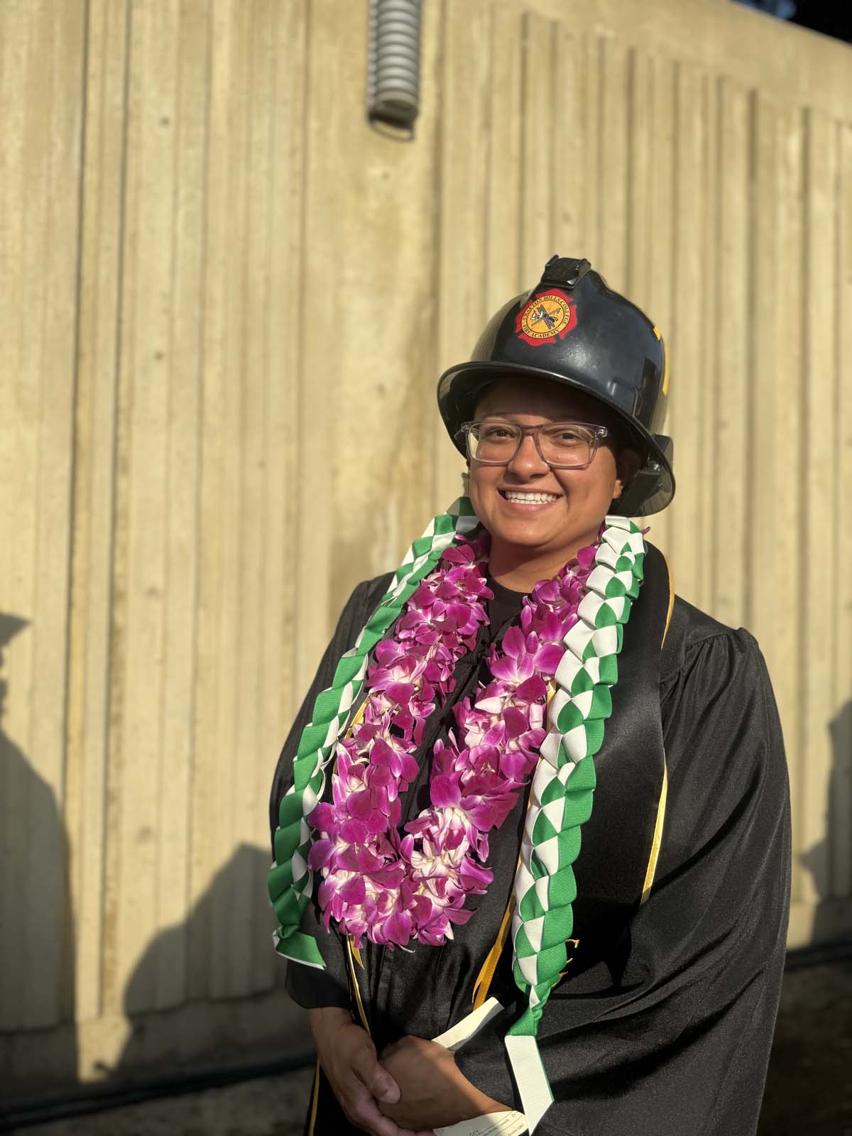 Graduates walk to stage at CHC's Commencement 2024.
