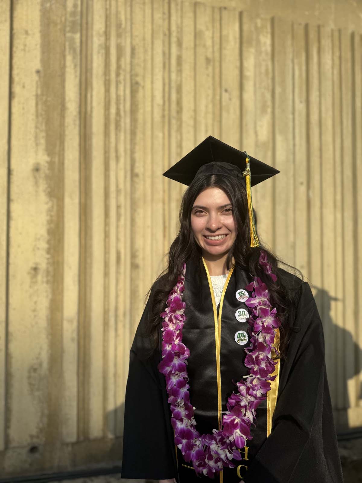 Graduates walk to stage at CHC's Commencement 2024.