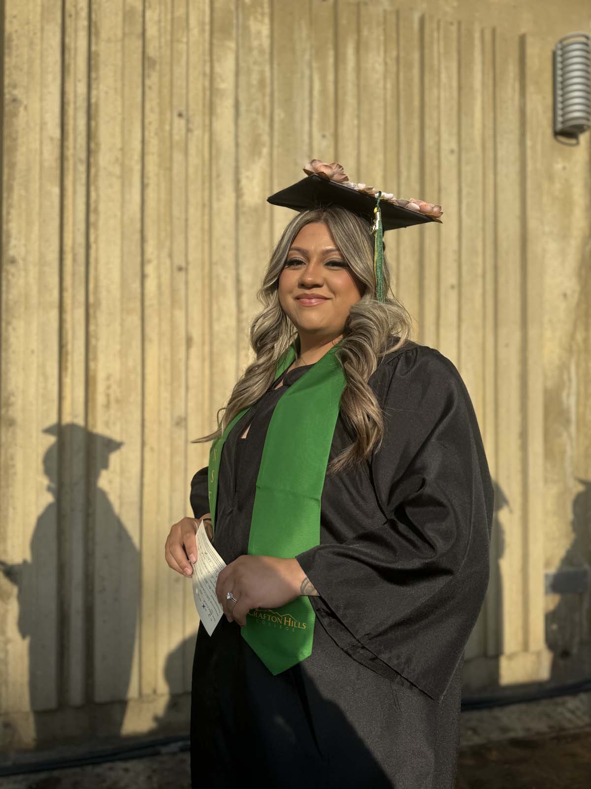 Graduates walk to stage at CHC's Commencement 2024.
