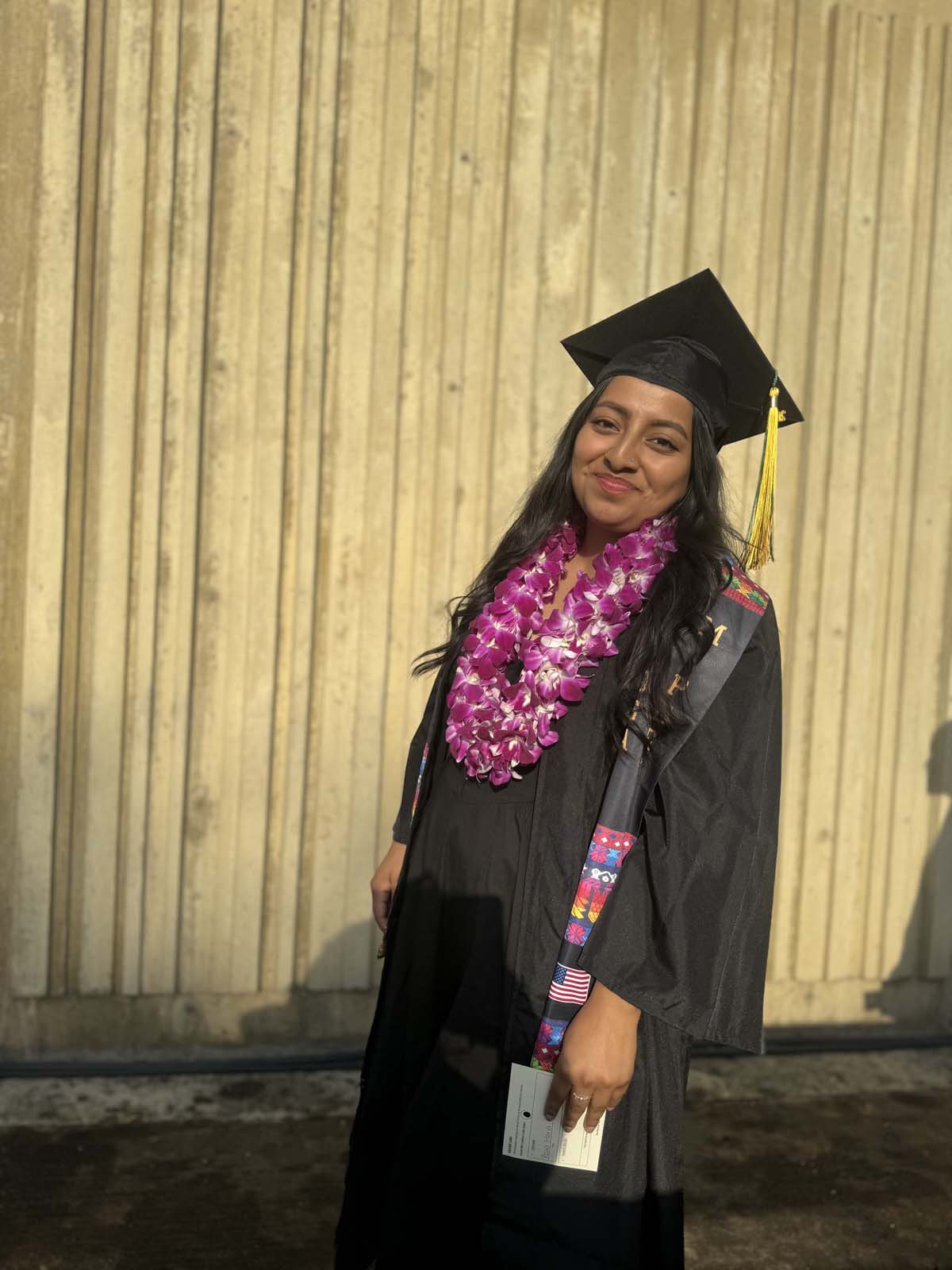 Graduates walk to stage at CHC's Commencement 2024.