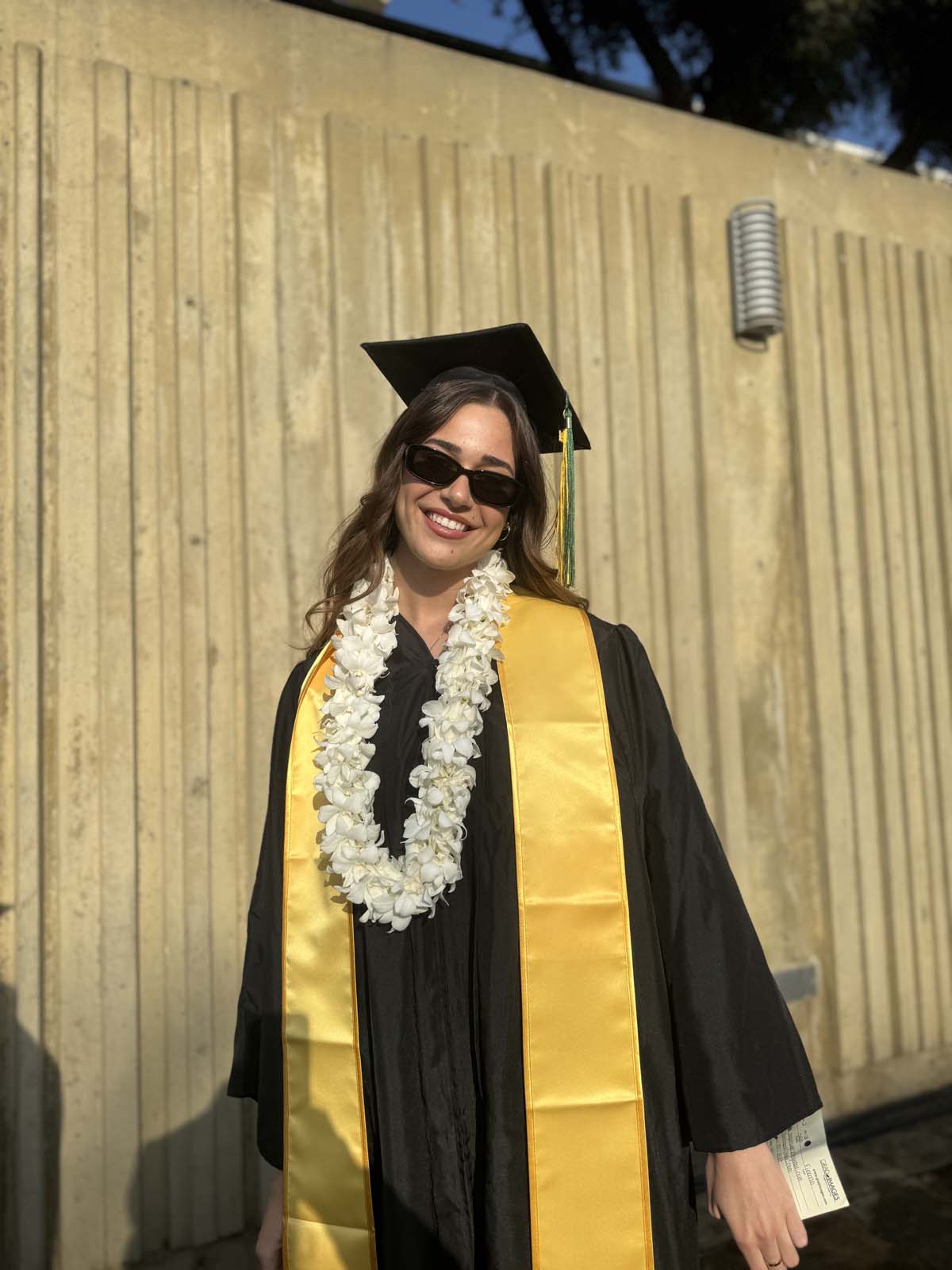 Graduates walk to stage at CHC's Commencement 2024.