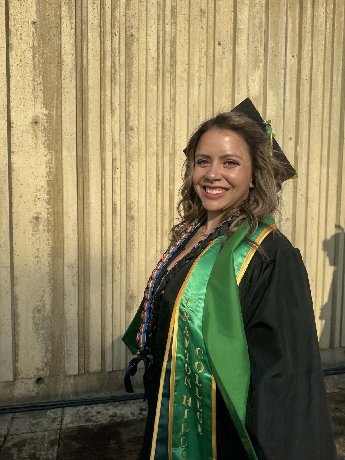 Graduates walk to stage at CHC's Commencement 2024.