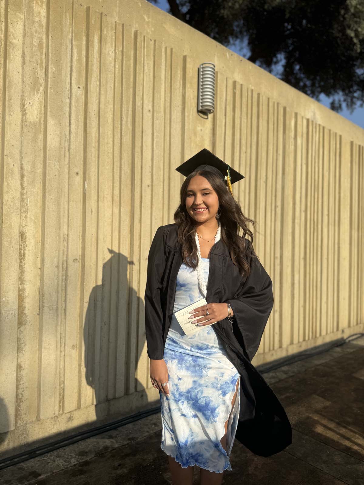 Graduates walk to stage at CHC's Commencement 2024.
