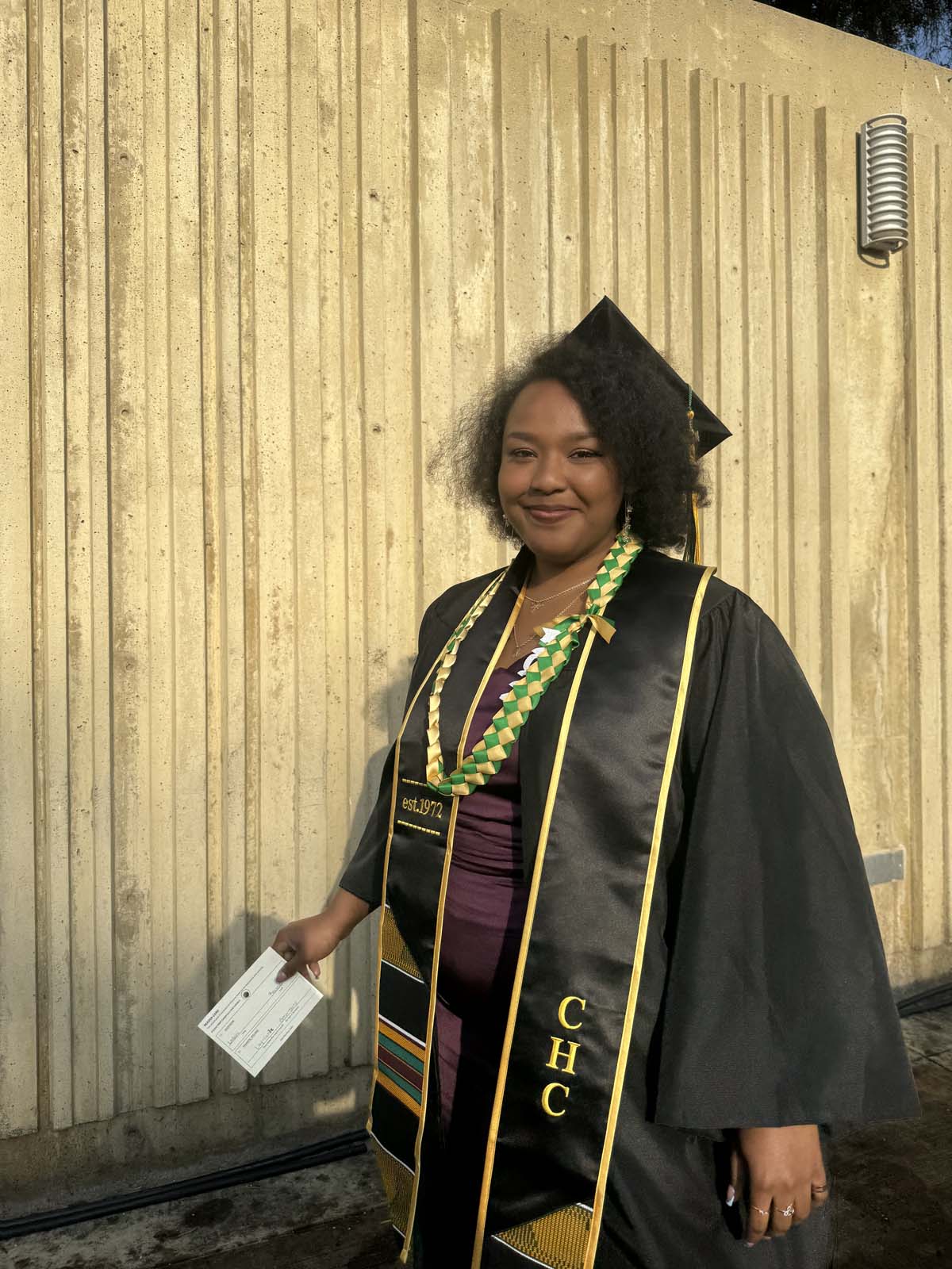 Graduates walk to stage at CHC's Commencement 2024.
