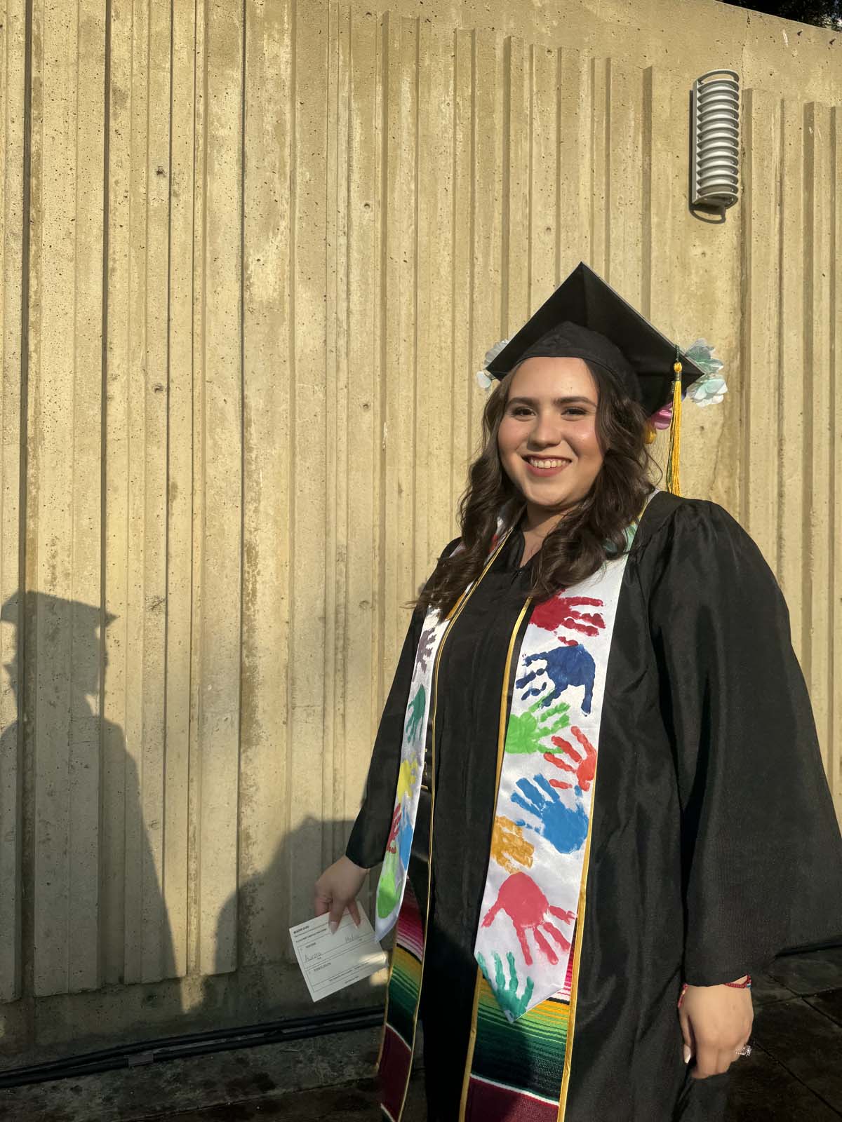 Graduates walk to stage at CHC's Commencement 2024.