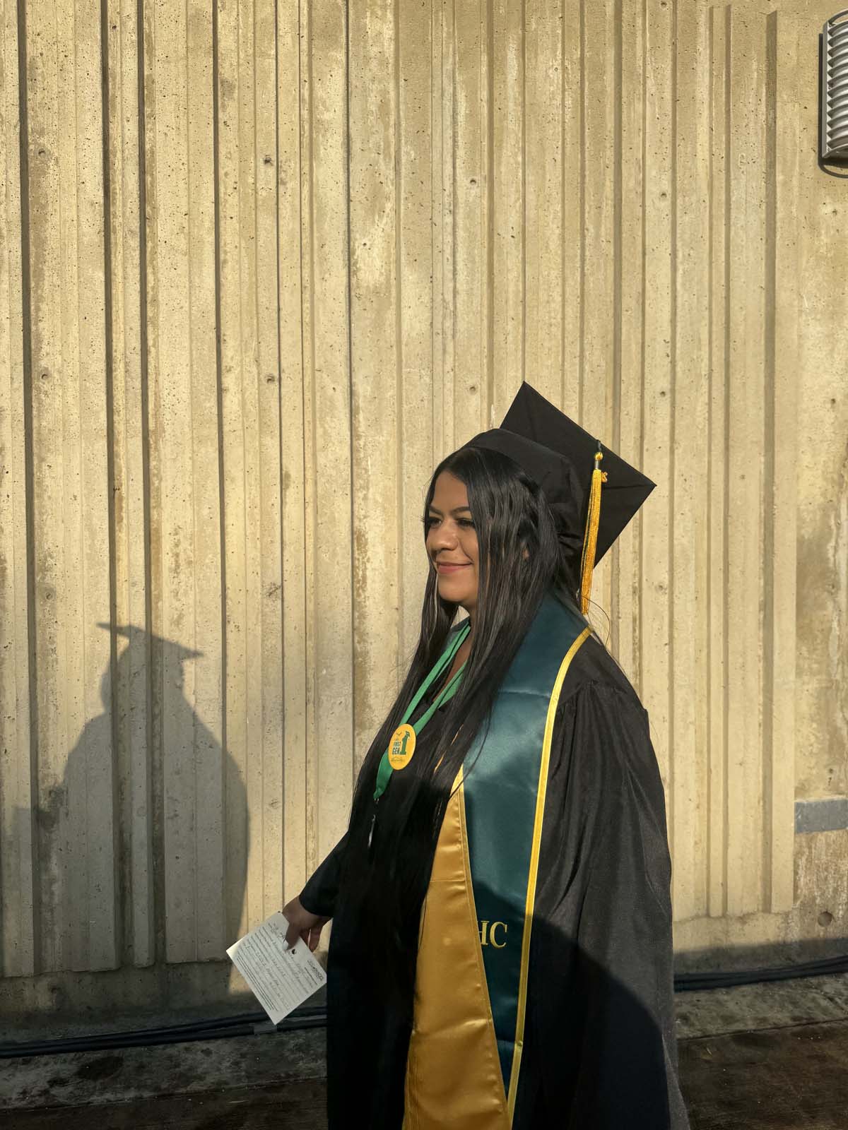 Graduates walk to stage at CHC's Commencement 2024.