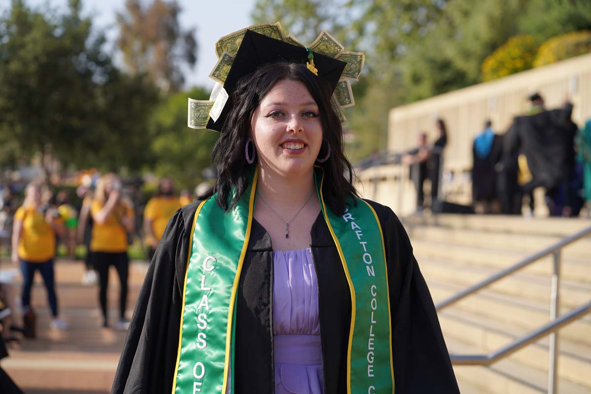 Graduates walk to stage at CHC's Commencement 2024.