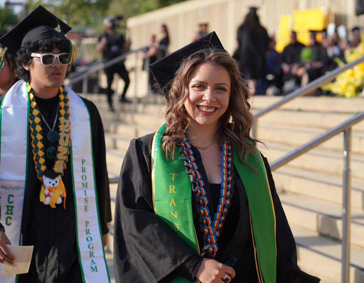 Graduates walk to stage at CHC's Commencement 2024.