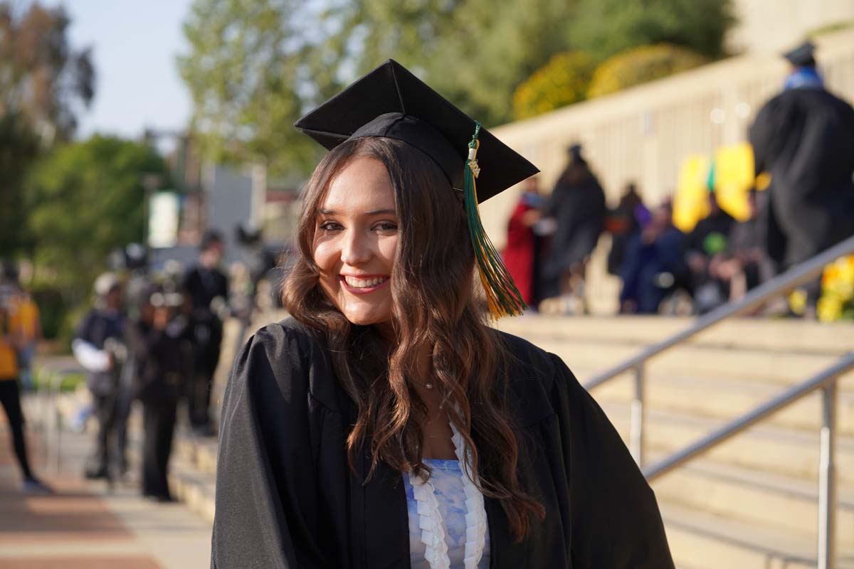 Graduates walk to stage at CHC's Commencement 2024.