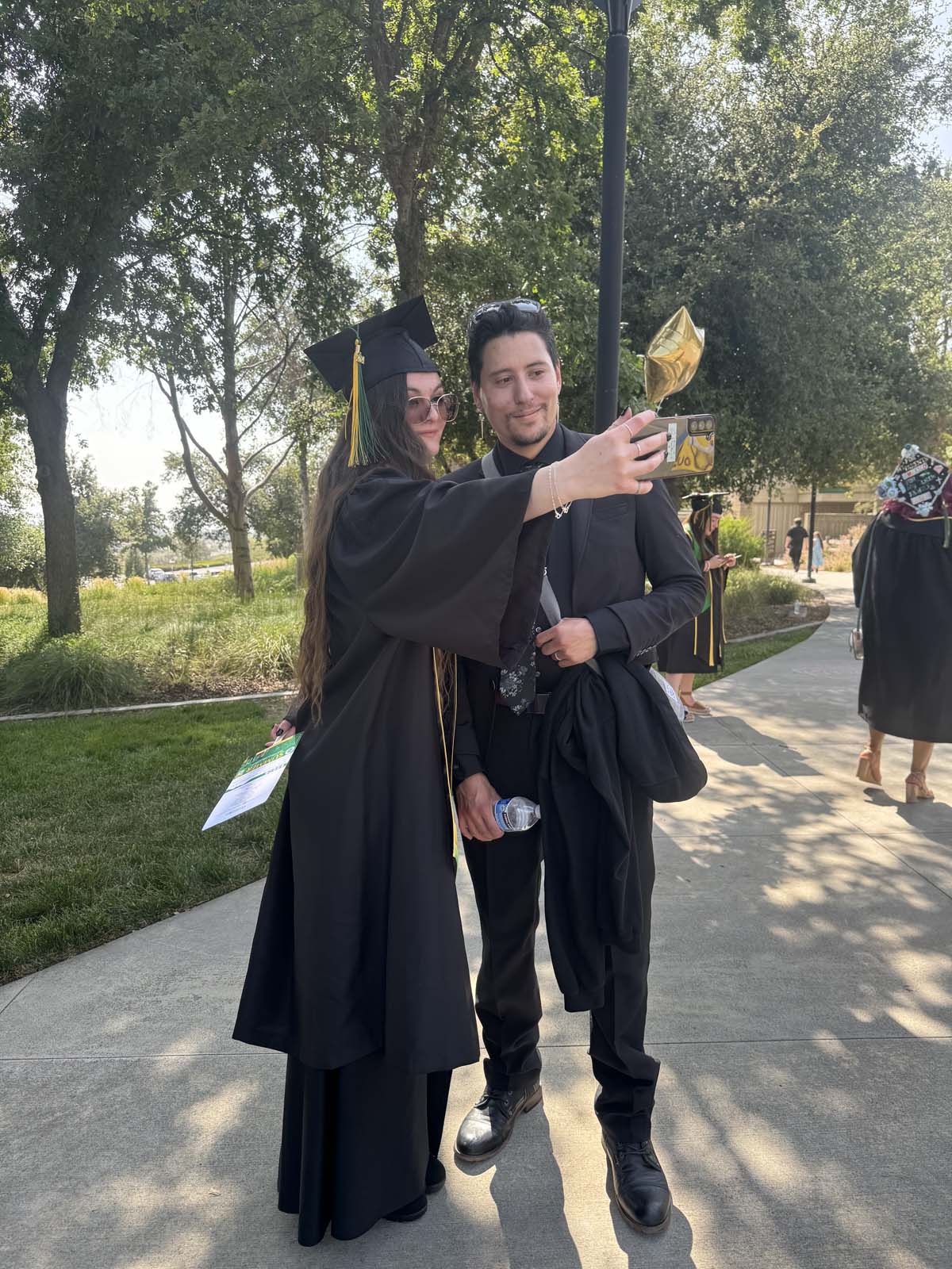 Graduates prepare for CHC Commencement 2024.