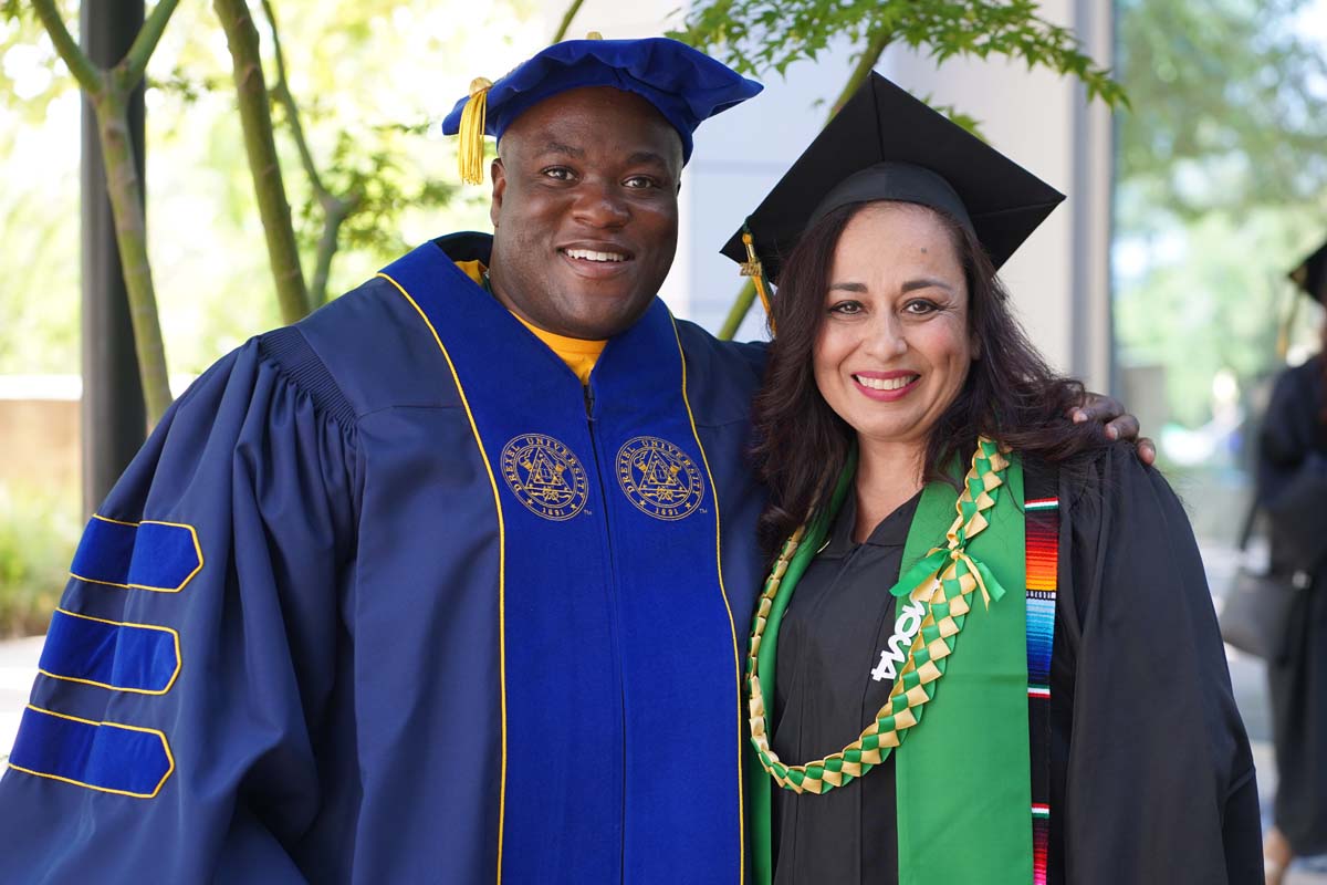 Graduates prepare for CHC Commencement 2024.