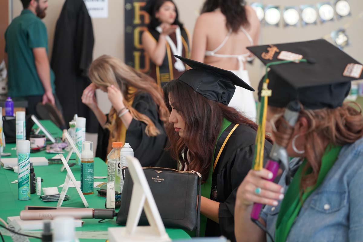 Graduates prepare for CHC Commencement 2024.