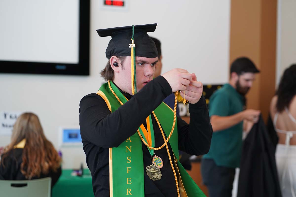 Graduates prepare for CHC Commencement 2024.