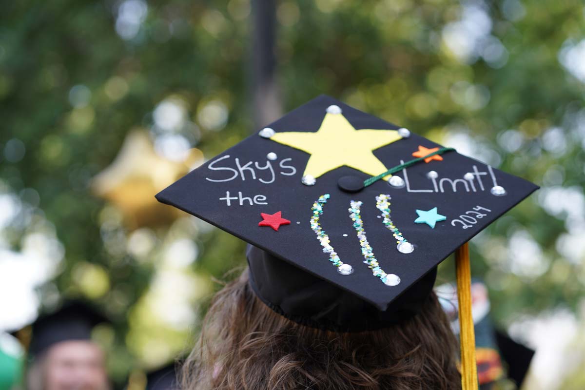 Graduates prepare for CHC Commencement 2024.