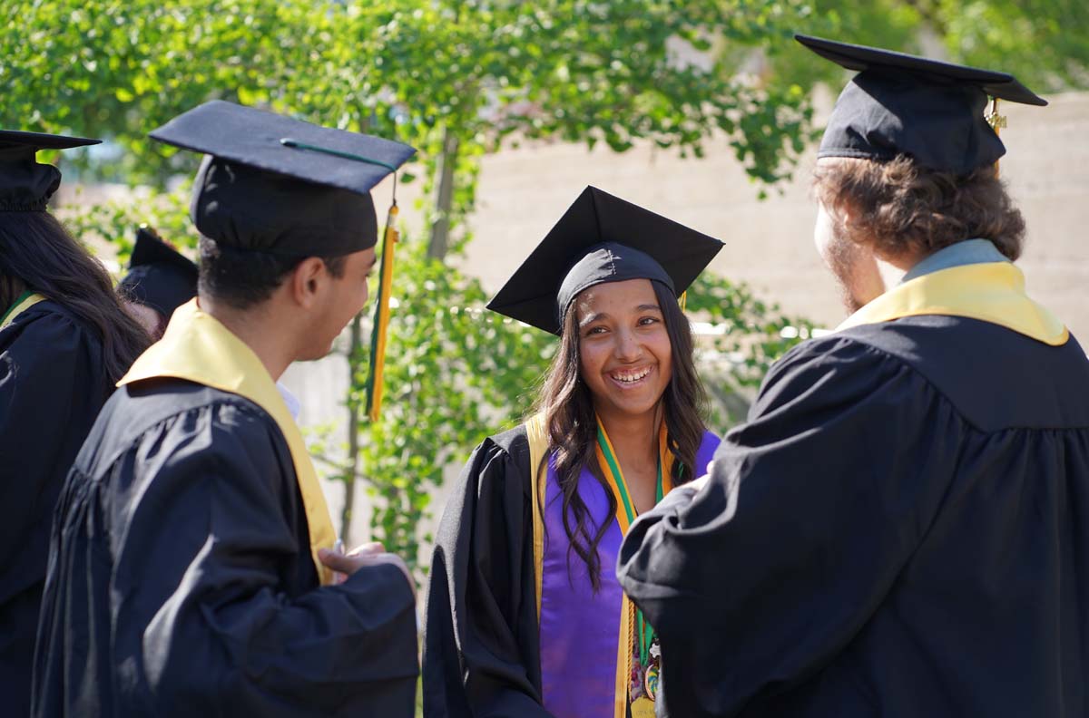 Graduates prepare for CHC Commencement 2024.