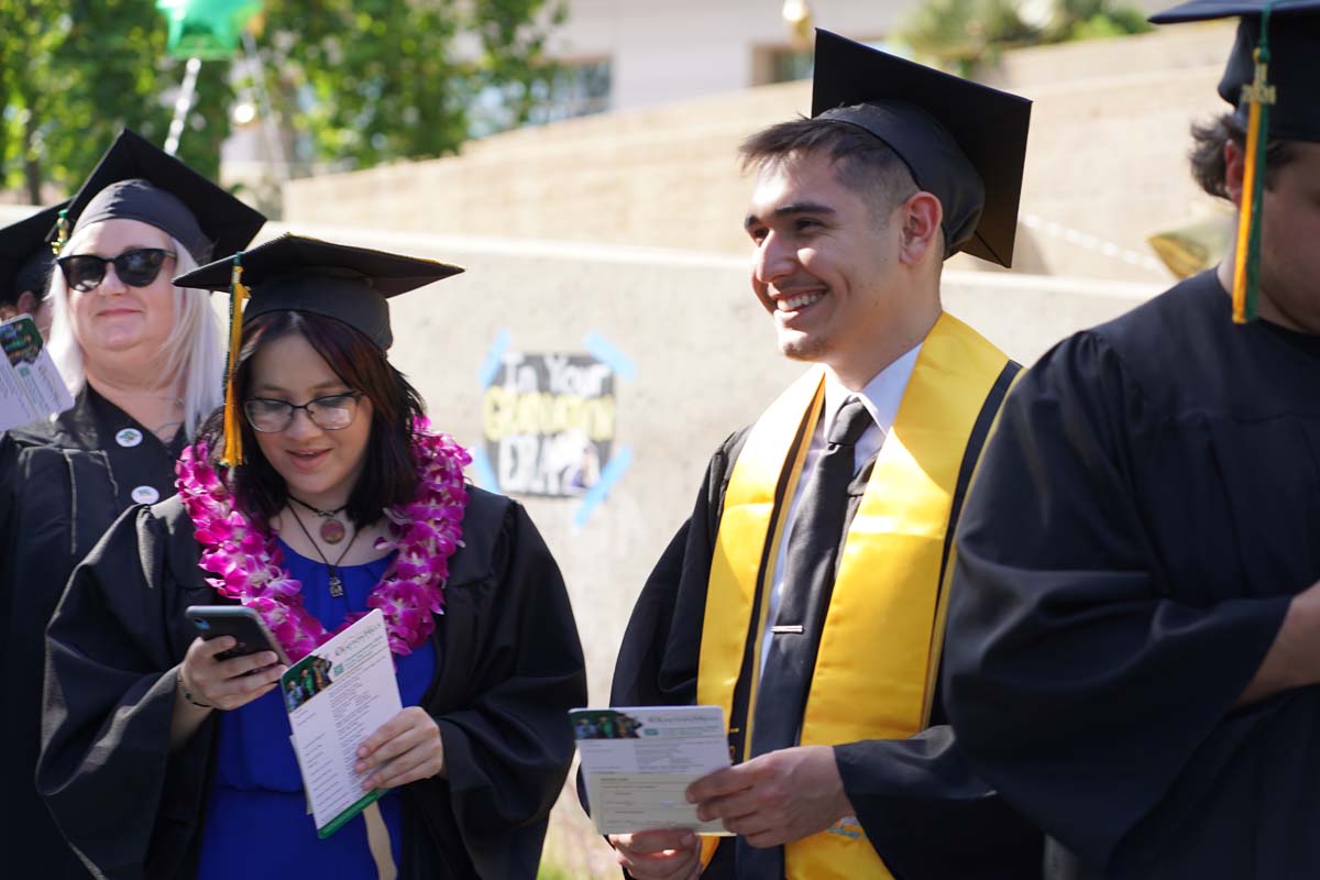 Graduates prepare for CHC Commencement 2024.