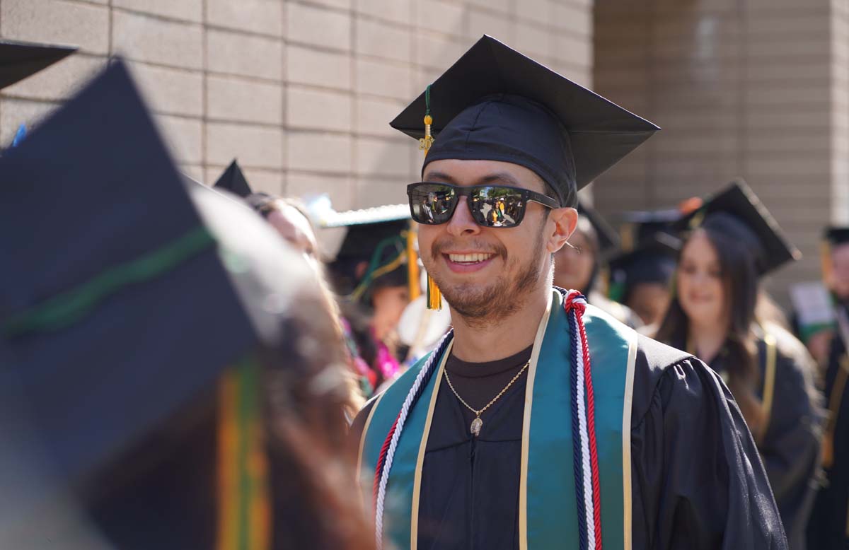 Graduates prepare for CHC Commencement 2024.