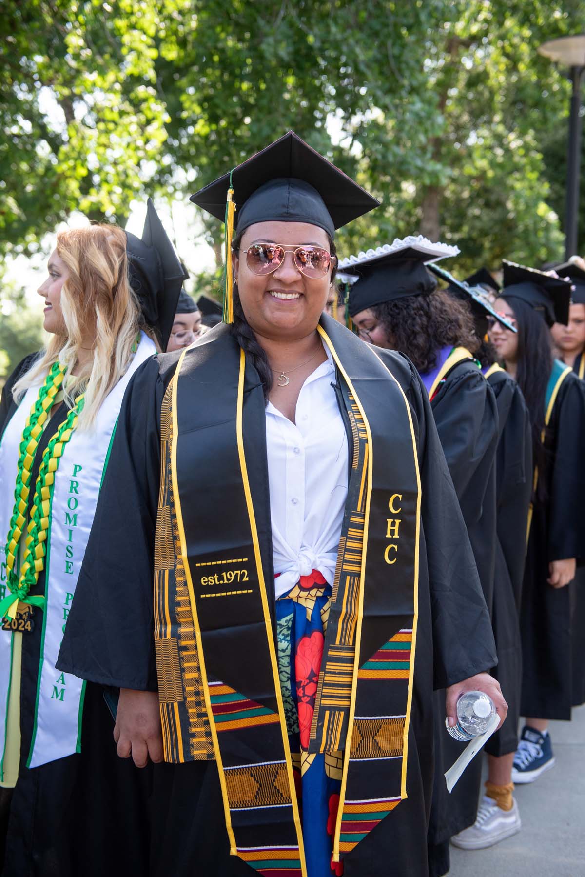 Graduates prepare for CHC Commencement 2024.