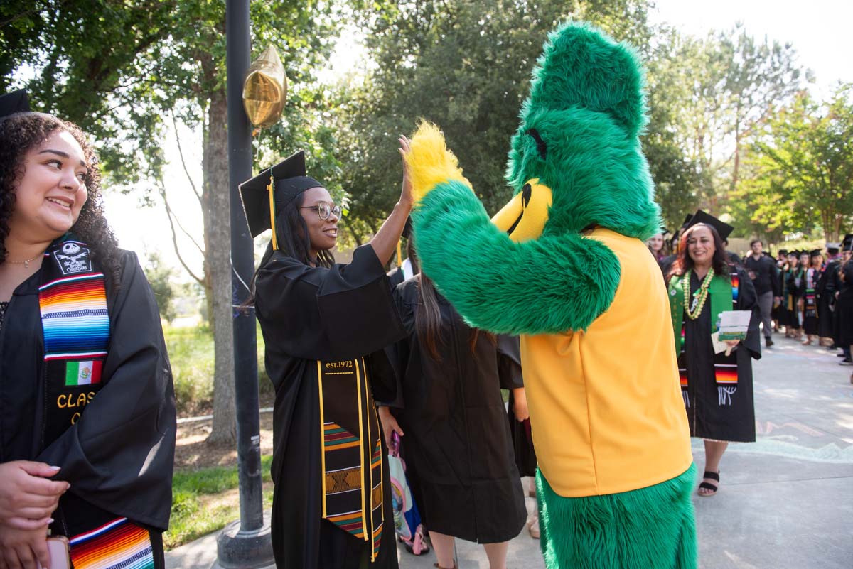 Graduates prepare for CHC Commencement 2024.