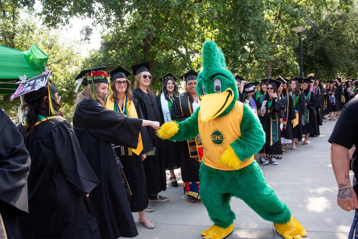 Graduates prepare for CHC Commencement 2024.