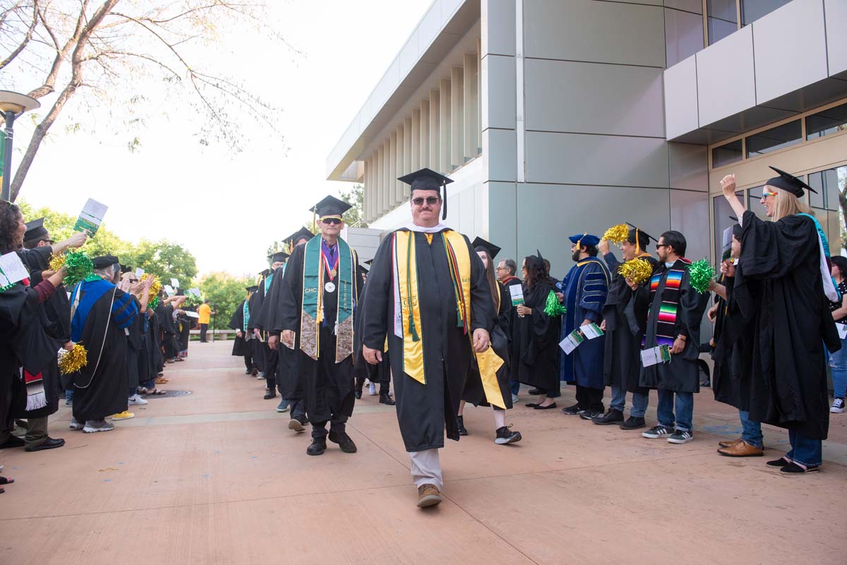Graduate and faculty processional at CHC's Commencement 2024.