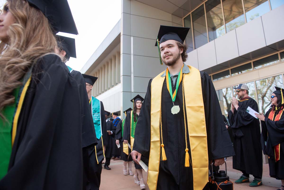 Graduate and faculty processional at CHC's Commencement 2024.