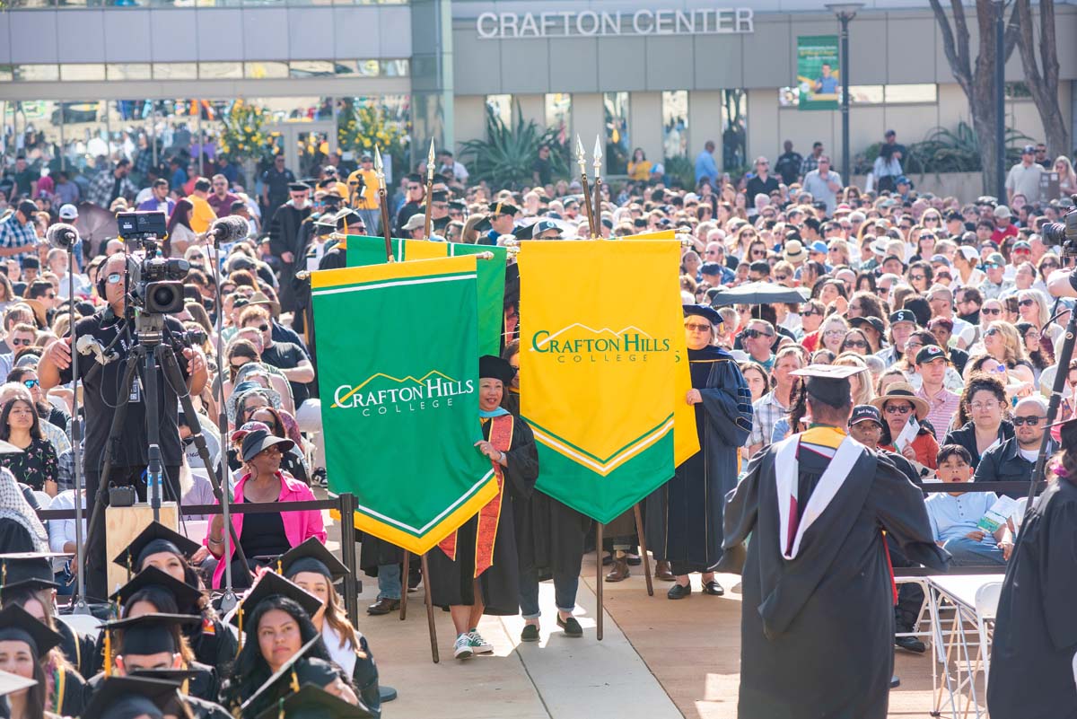 Graduate and faculty processional at CHC's Commencement 2024.