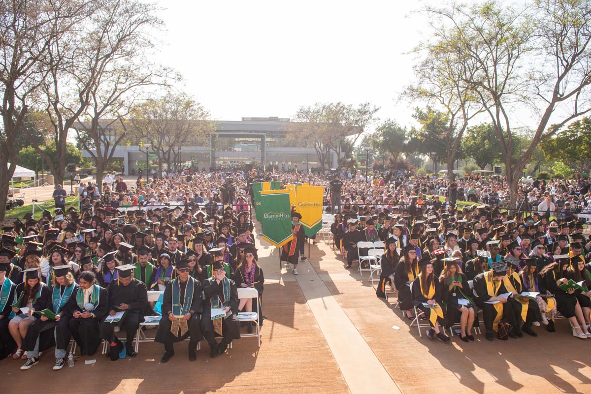 Graduate and faculty processional at CHC's Commencement 2024.