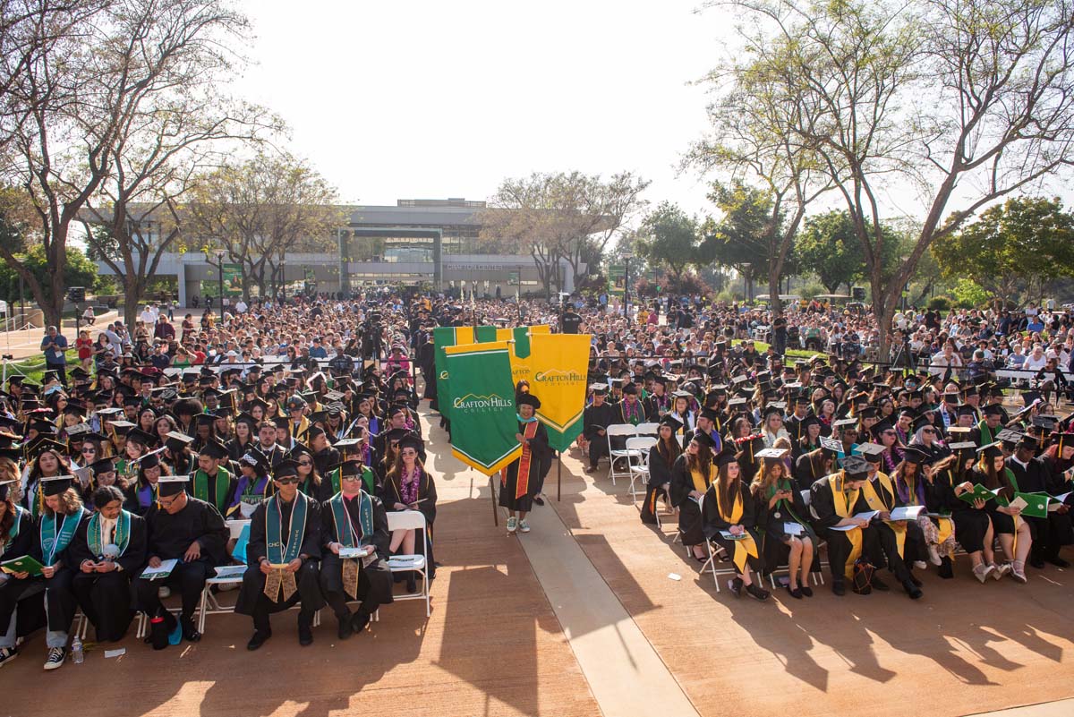 Graduate and faculty processional at CHC's Commencement 2024.