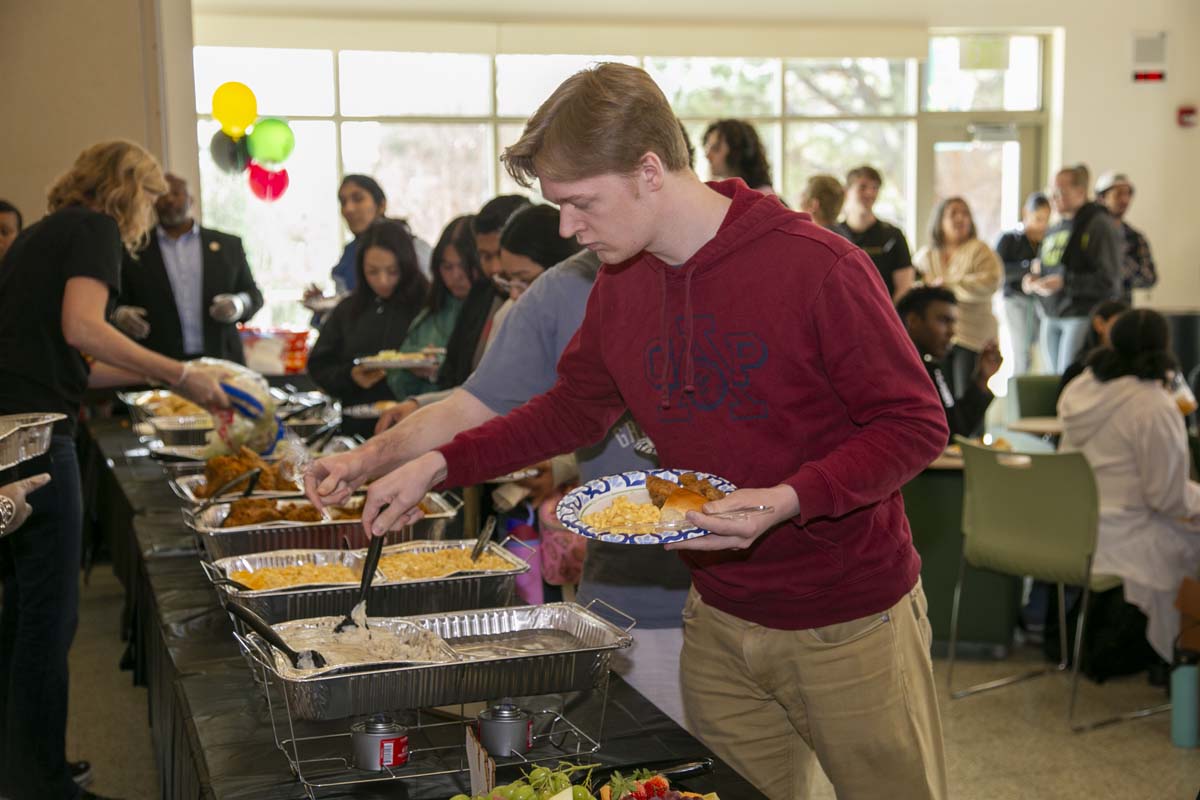 People enjoying the Black History Month closing ceremony
