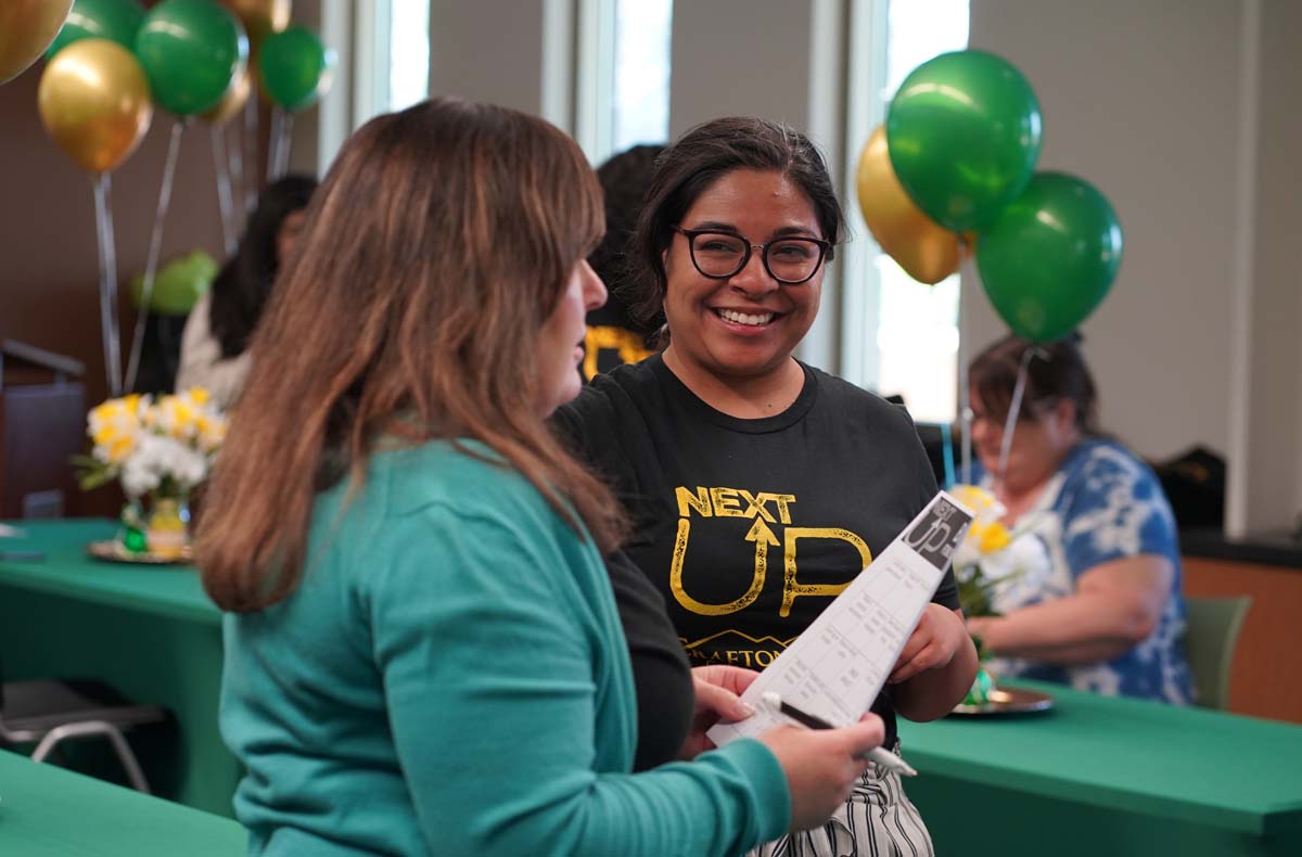 People enjoying the Foster Care Luncheon