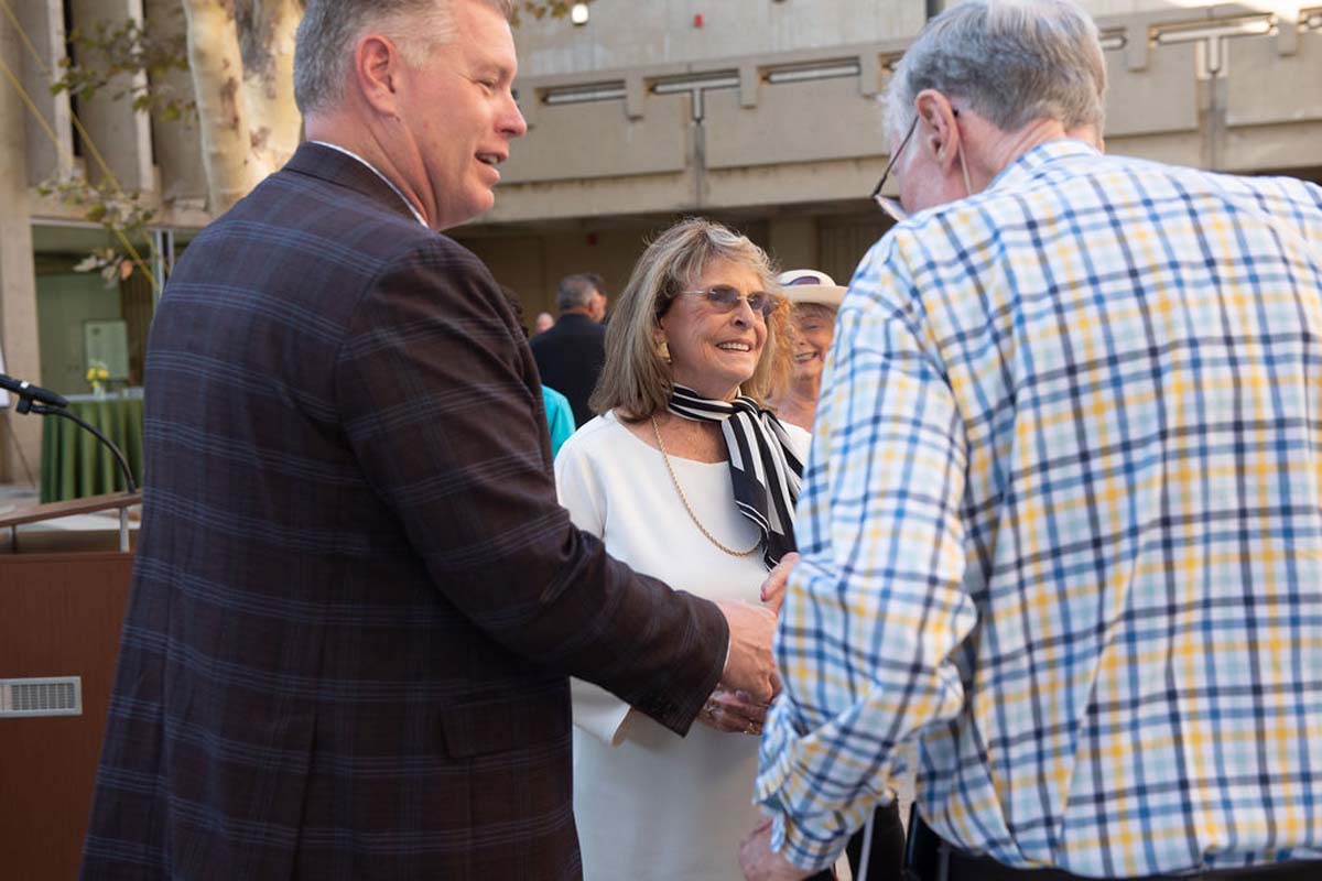 Attendees enjoying the naming ceremony