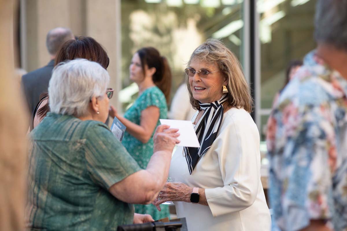Attendees enjoying the naming ceremony