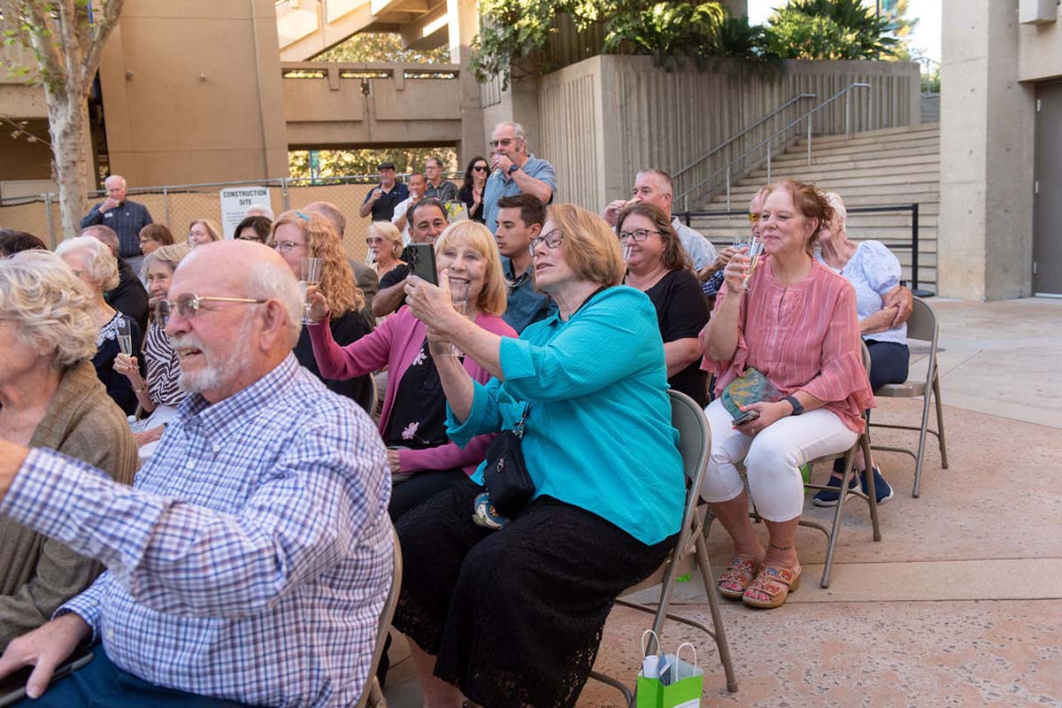 Attendees enjoying the naming ceremony