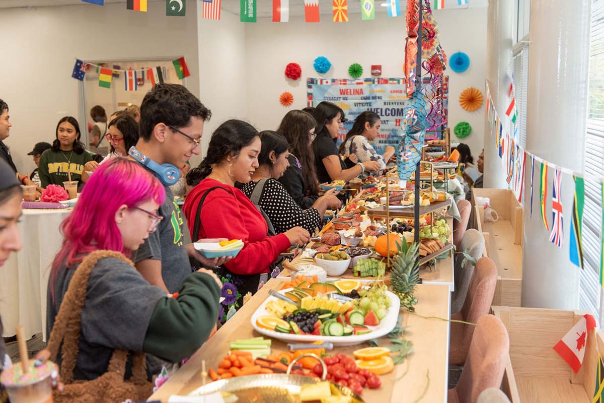 Attendees enjoing the Multicultural Center Grand Opening
