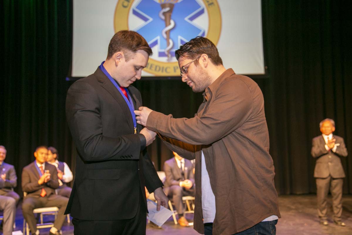 People enjoying EMT graduation