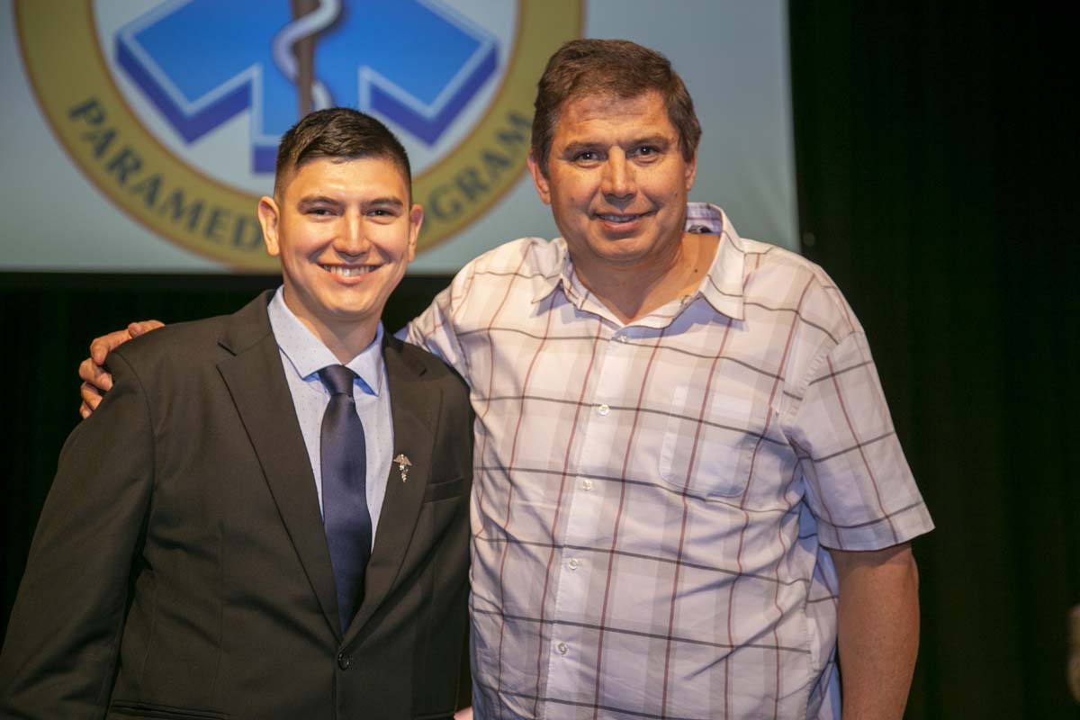 CHC Paramedic Grad with father.