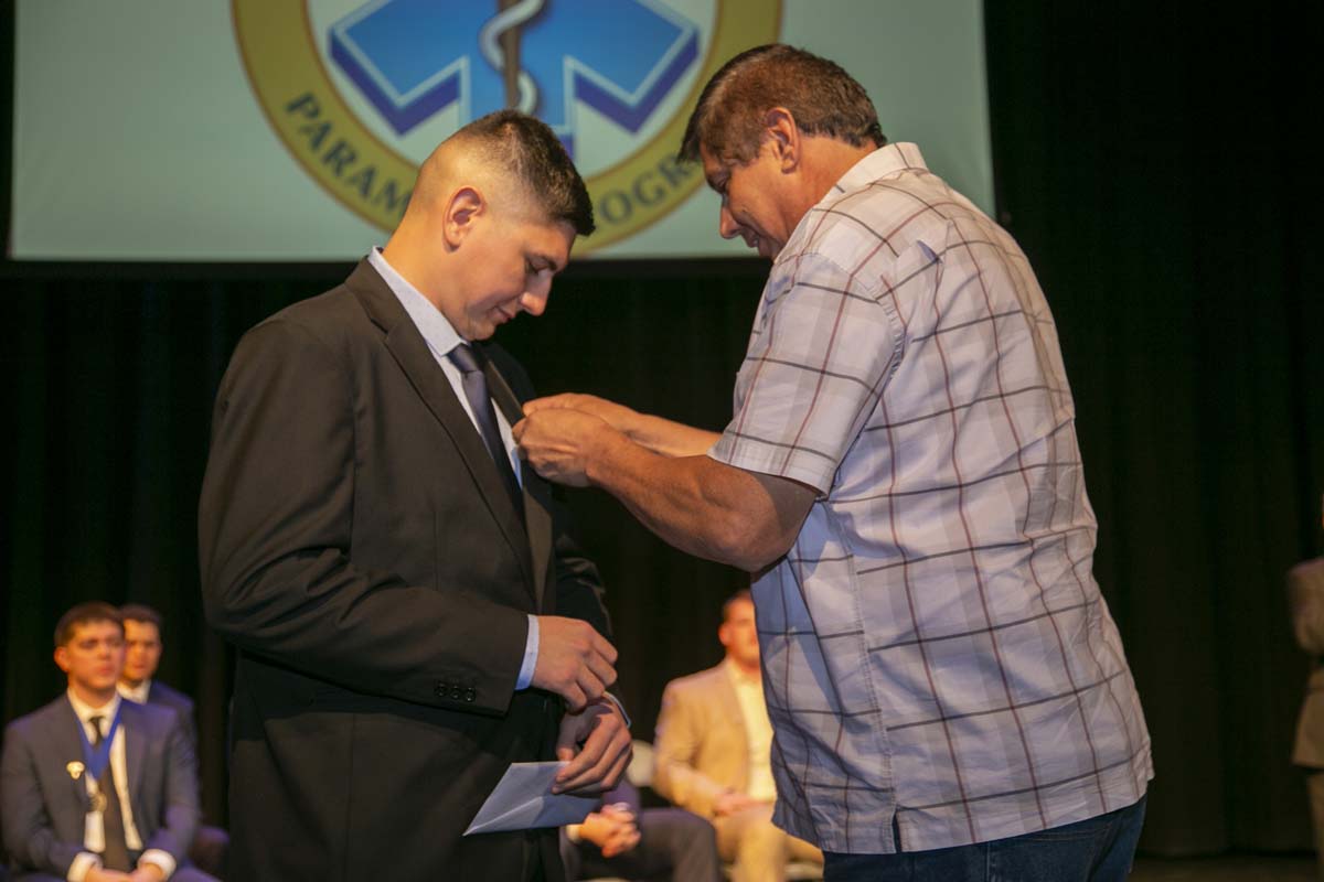 CHC Paramedic Grad with father.