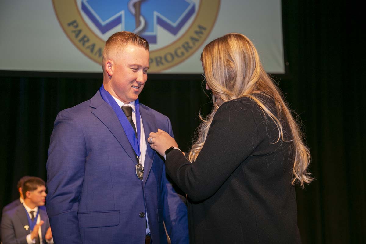 CHC Paramedic Grad with father.